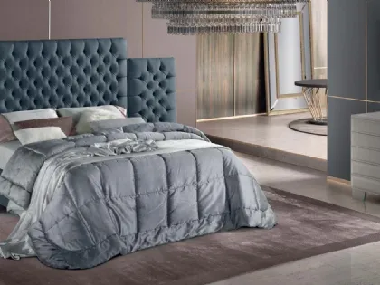 Letto dal design elegante con imponente testiera in tessuto trapuntato Tosca di Stilfar