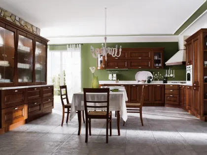 Cucina in legno finitura noce ad angolo con piano in marmo Laguna 02 di Gicinque